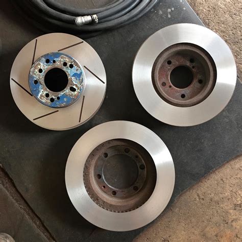 resurface rotors vs replace